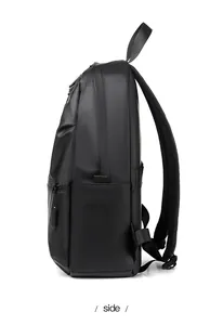 Side view of black water-resistant laptop backpack with zipper pocket and padded straps