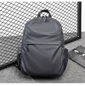 Close-up of minimalist dark grey backpack with high-density fabric and side pocket