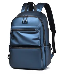 Side view of dark blue water-resistant business backpack with multiple compartments