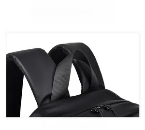 Detailed top view of matte black backpack with padded straps and reinforced woven handle