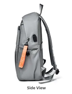Side view of grey water-resistant laptop backpack with integrated USB charging port