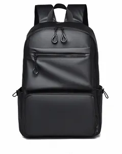 Front view of black minimalist backpack featuring waterproof matte fabric and ring zip pulls