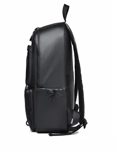 Side view of black water-resistant business backpack with adjustable side pocket and mesh straps
