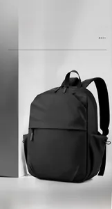 Close-up of high-capacity water-resistant black laptop backpack with dual zipper compartments