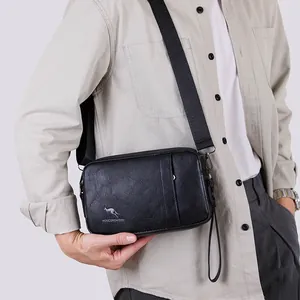 Men's black faux leather crossbody bag with lychee texture and adjustable strap
