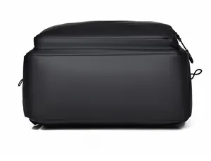 Flat bottom view of black waterproof backpack showing durable matte nylon texture
