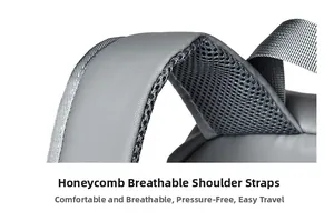 Detail view of honeycomb breathable shoulder strap on gray laptop backpack for comfort