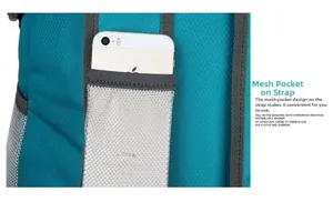 Detail of shoulder strap mesh pocket on lightweight hiking backpack holding a smartphone