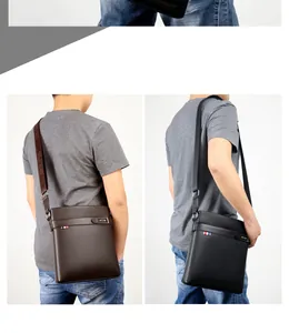 Detail view of men's briefcase showing textured faux leather and adjustable shoulder strap