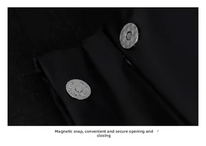 Detail of premium magnetic snap fastener on black fabric for secure and easy closure