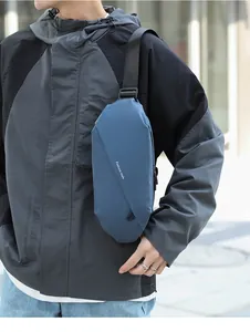 Waterproof dark blue men's chest bag with Fashion Male lettering on urban street