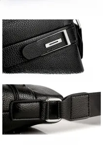 Detail of black pebbled leather briefcase with silver metal hardware and woven strap