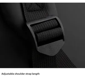 Detail of high-density nylon webbing with an adjustable matte plastic buckle on a backpack