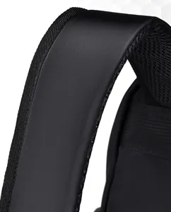 Macro shot of breathable honeycomb mesh shoulder straps on a black travel backpack
