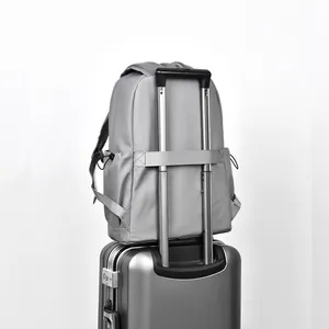 Gray large capacity travel backpack with luggage strap on suitcase handle for business