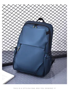 Detail of dark blue waterproof nylon backpack with yellow zipper accents and side pocket