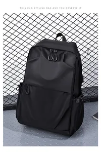 Detail of waterproof matte black backpack featuring hidden zipper pockets and industrial style