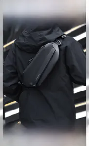 Waterproof black crossbody chest bag with adjustable strap and functional street style