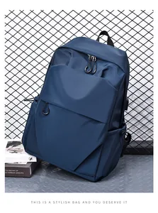 Detail of dark blue waterproof nylon backpack with hidden zipper and side pocket