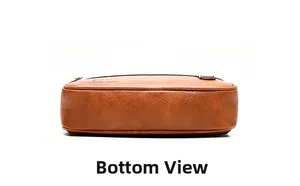 Detail view showing smooth base and clean stitching on the caramel leather crossbody bag