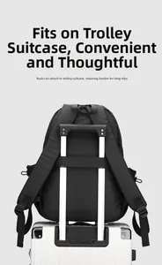 Detail of waterproof black laptop backpack featuring a trolley sleeve for travel luggage