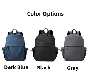 Waterproof laptop backpack shown in navy blue, black, and grey colors in a side-by-side view