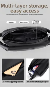 Detail view of black tactical chest bag with multi-layer pockets and interior compartments