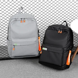 Large capacity casual backpack in gray and black with orange fashion strap details