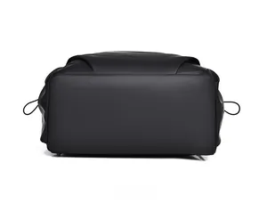 Flat rectangular bottom view of waterproof black backpack with elastic drawstring details