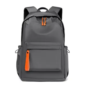 Men's casual business backpack in dark grey with orange zipper accents for travel and laptop