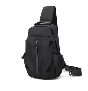 Side view of black nylon chest bag showing zipper compartments and breathable mesh strap