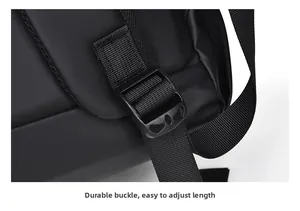 Macro detail of thick adjustable buckle on black waterproof backpack strap