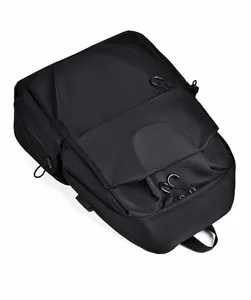 Detailed top view of black water-resistant business backpack with sturdy handles and hooks
