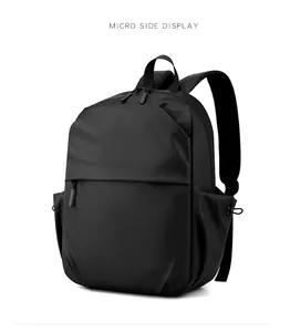 Close-up side view of black waterproof laptop backpack with functional side pockets