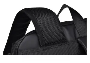Detail of ergonomic breathable mesh shoulder straps on black commuter laptop backpack