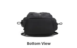 Bottom view of black sports crossbody bag showing waterproof material and side drawstring