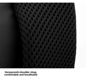 Macro shot of honeycomb mesh shoulder straps on a breathable black laptop backpack