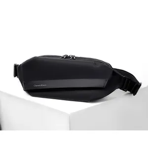 Detail of waterproof matte black chest bag with dual metal zippers and techwear buckle