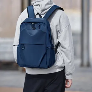 Waterproof navy blue backpack with large capacity for travel and outdoor activities