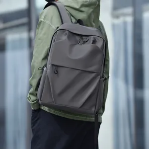 Men's large capacity dark grey backpack for travel and laptop in a modern urban style