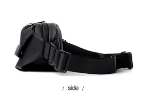 Side view of men's mini black crossbody bag showing matte texture and adjustable strap