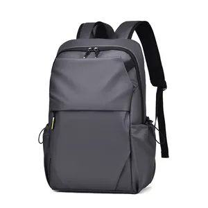 Minimalist dark gray 15-inch laptop backpack in waterproof nylon with side pockets
