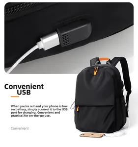 Detail of backpack with external USB charging port and orange zipper puller accent