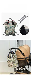 Detail of waterproof diaper bag with floral patterns and hooks for stroller attachment