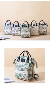 Detail of multi-patterned diaper backpack featuring large opening and durable fabric