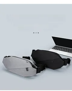 Detail of durable Oxford cloth waist bags in grey and black with adjustable straps