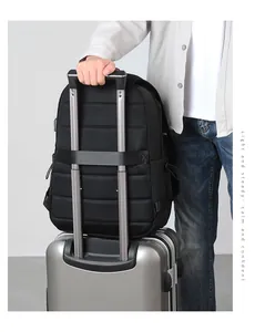 Detail of travel backpack with luggage strap and breathable mesh on a suitcase handle