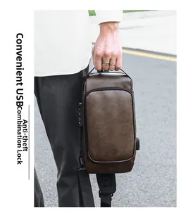 Detail of vintage brown leather crossbody bag with USB port and anti-theft combination lock
