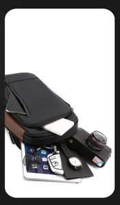 Macro shot of multifunctional sling bag compartments showing ample storage capacity