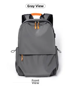 Front view of a grey waterproof business casual backpack with orange accents and padded straps